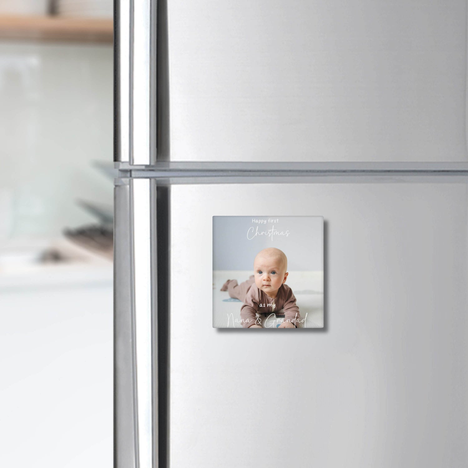 Square glossy Christmas photo magnet featuring baby picture with custom text for Nana and Grandad – personalised festive gift.