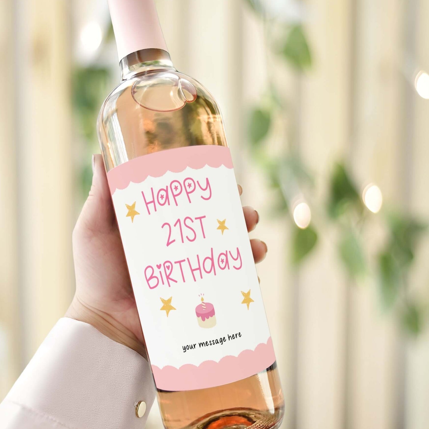 Custom wine label for a 21st birthday gift for girls, featuring pink text, stars, and a cake illustration on a wine bottle.
