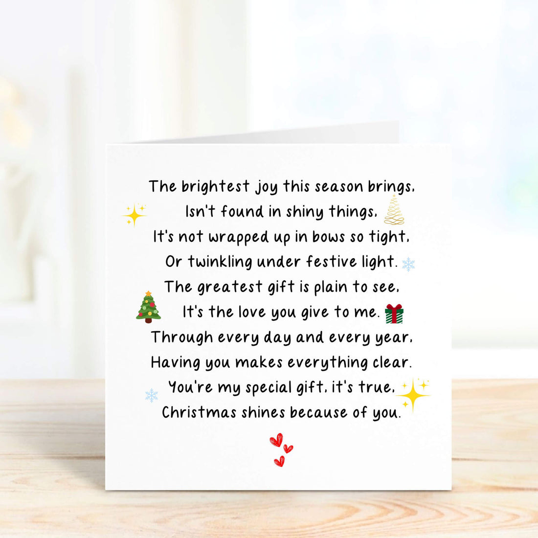 Personalised Christmas card featuring a heartfelt poem with festive icons like a Christmas tree, presents, and stars. Perfect for sharing love and joy during the holiday season.