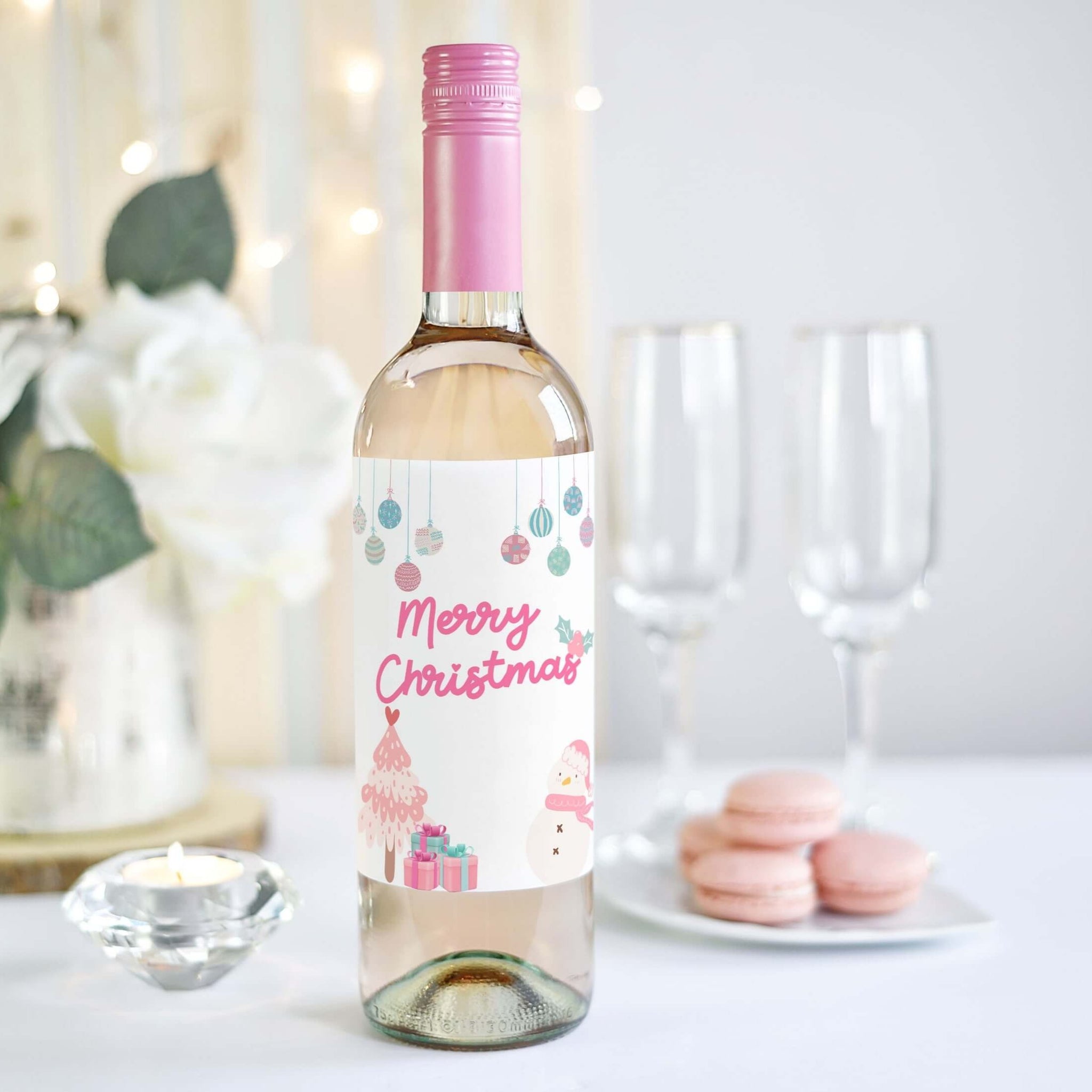 a cute pink wine label with merry christmas message