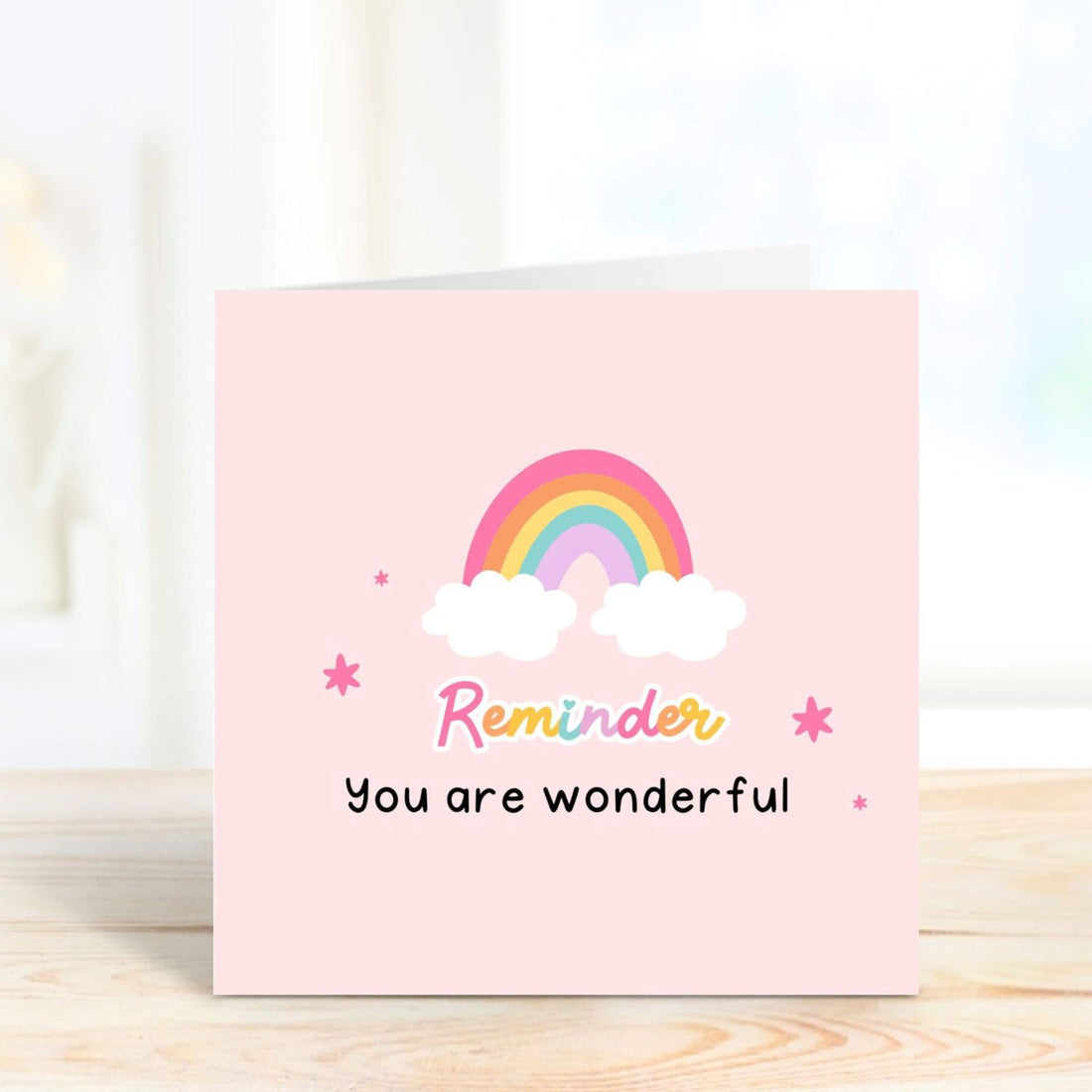 reminder - you are wonderful card with a rainbow design in a pink background