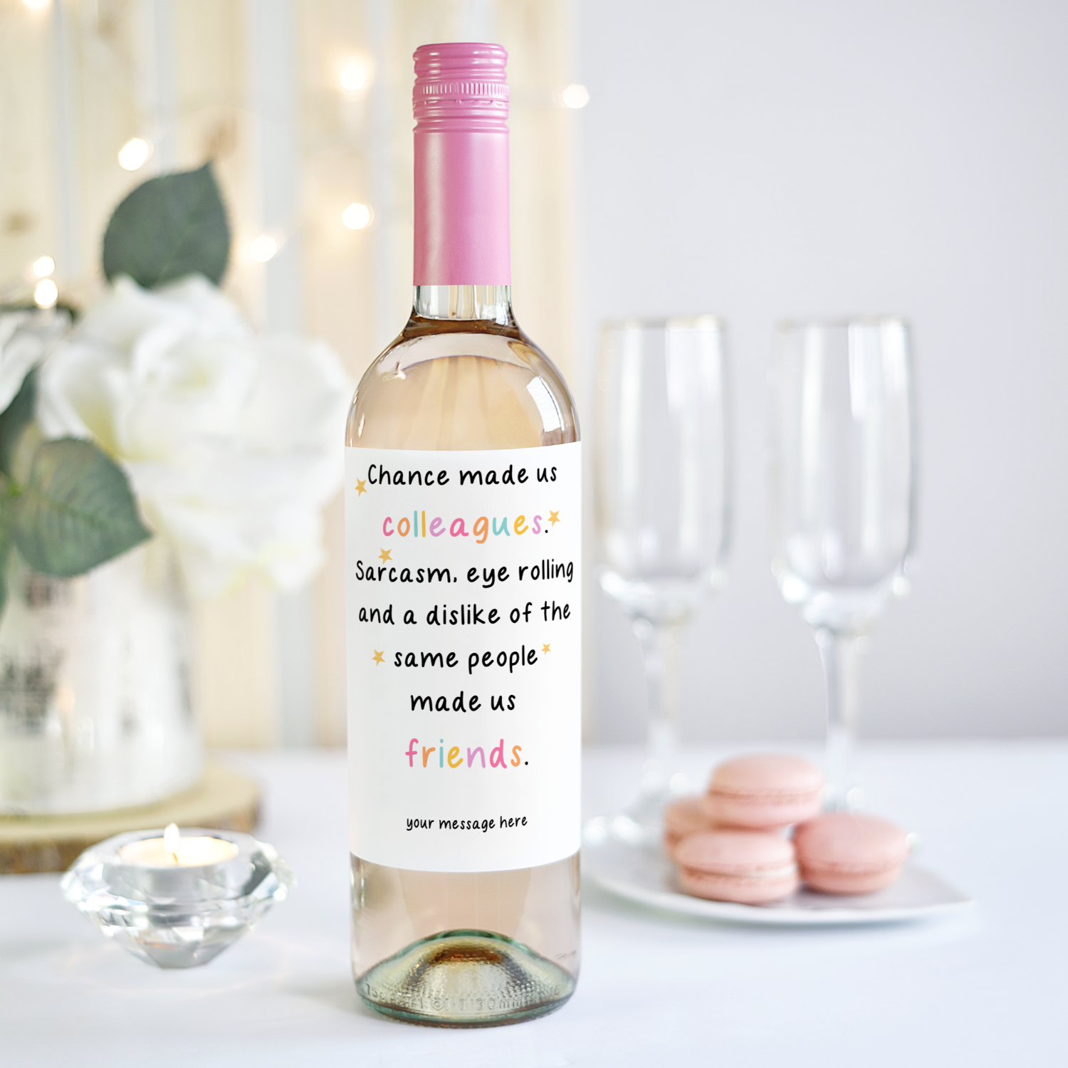 A humorous personalised wine label on a pink-capped wine bottle, perfect for gifting to colleagues and friends on special occasions.