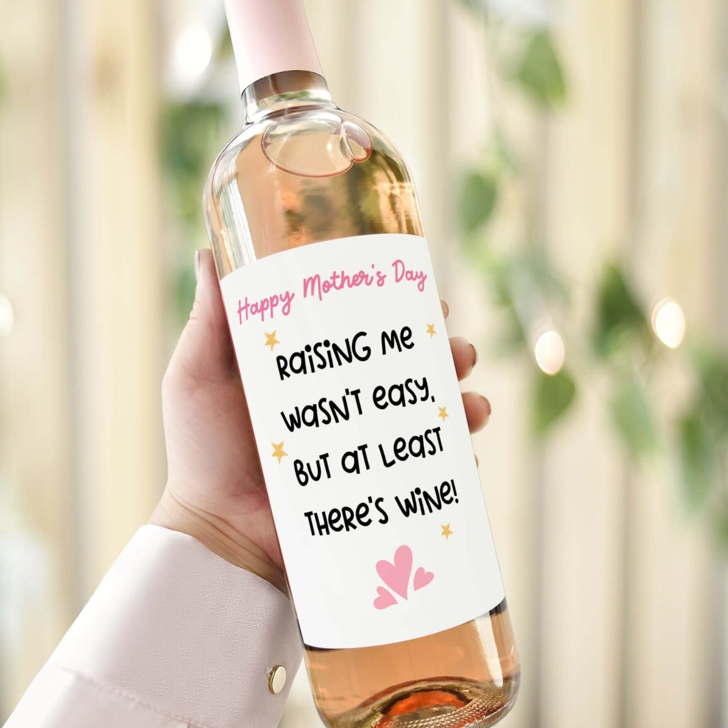 Funny Mother's Day wine label with the message "Raising Me Wasn't Easy, But At Least There's Wine," perfect gift for mums.

Alt Text 2: