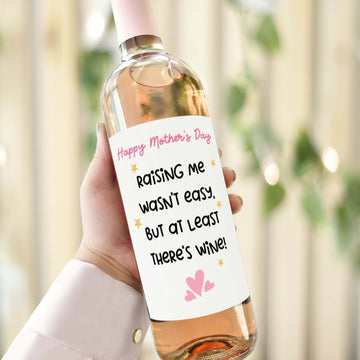 Funny Mother's Day wine label with the message "Raising Me Wasn't Easy, But At Least There's Wine," perfect gift for mums.

Alt Text 2: