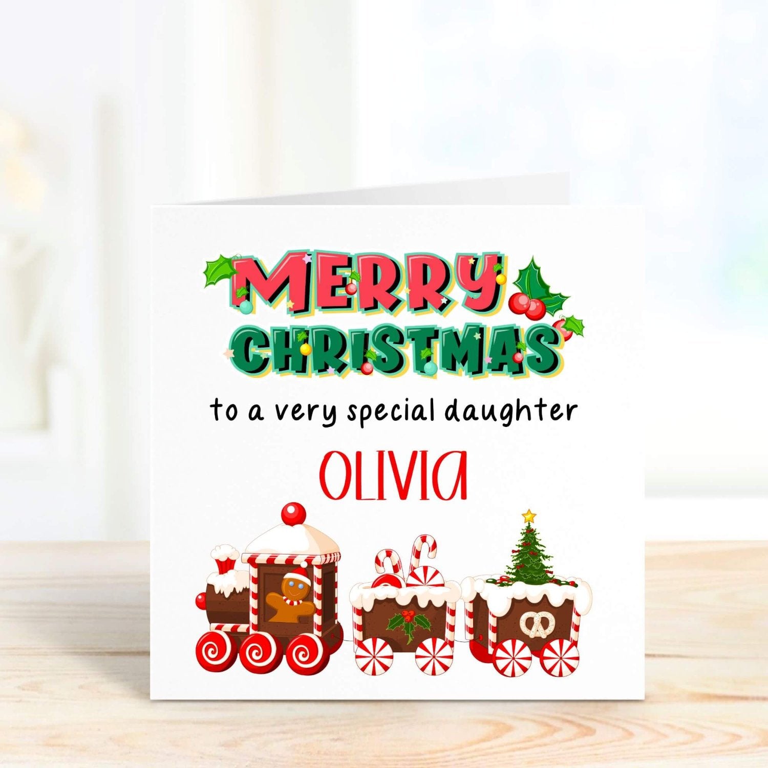 A cute christmas card for daughter with a playful font and a cute train
