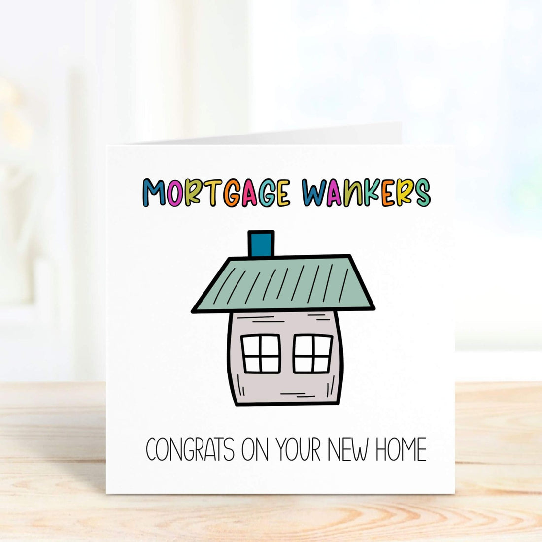 personalised card for new home with the words mortgage wankers