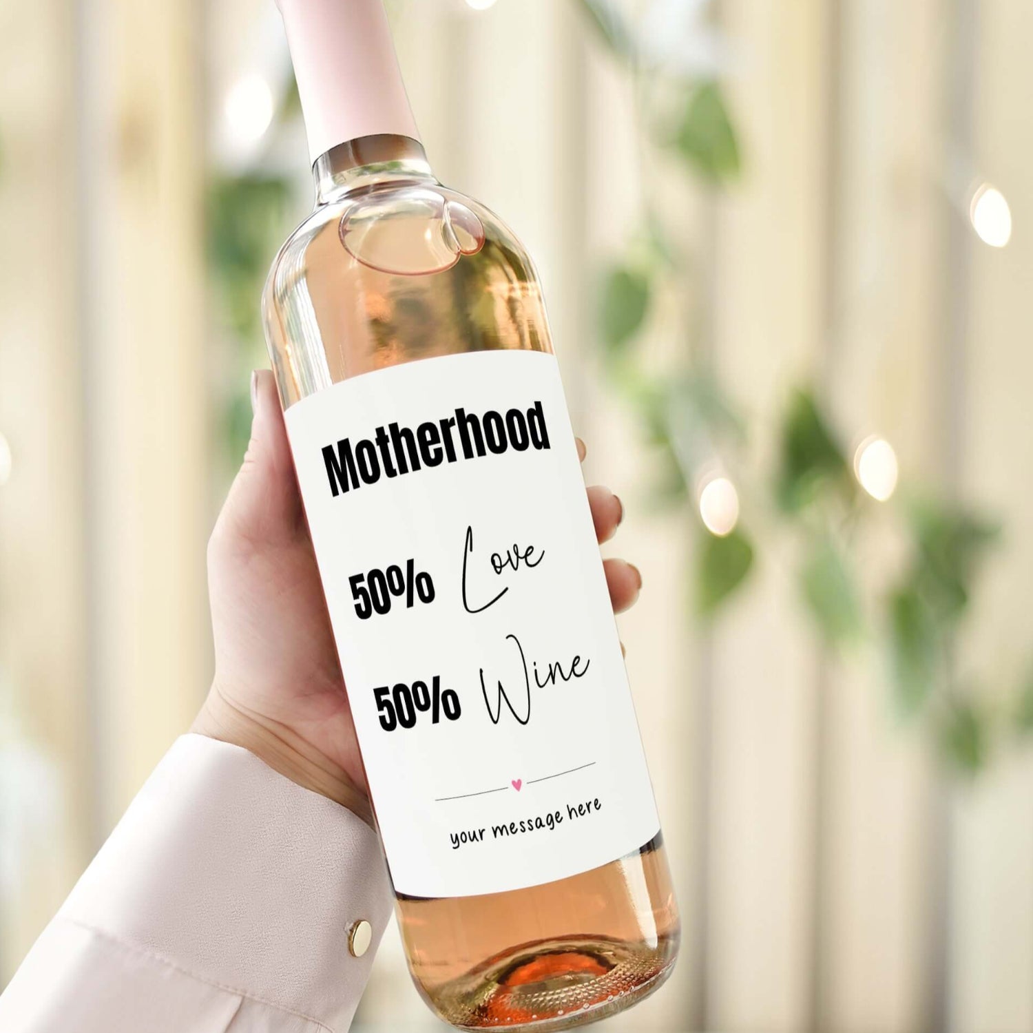 Funny Mother’s Day wine label that reads "Motherhood: 50% Love, 50% Wine." A unique and humorous gift for wine-loving mums.