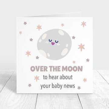 over the moon to hear about your baby news personalised card