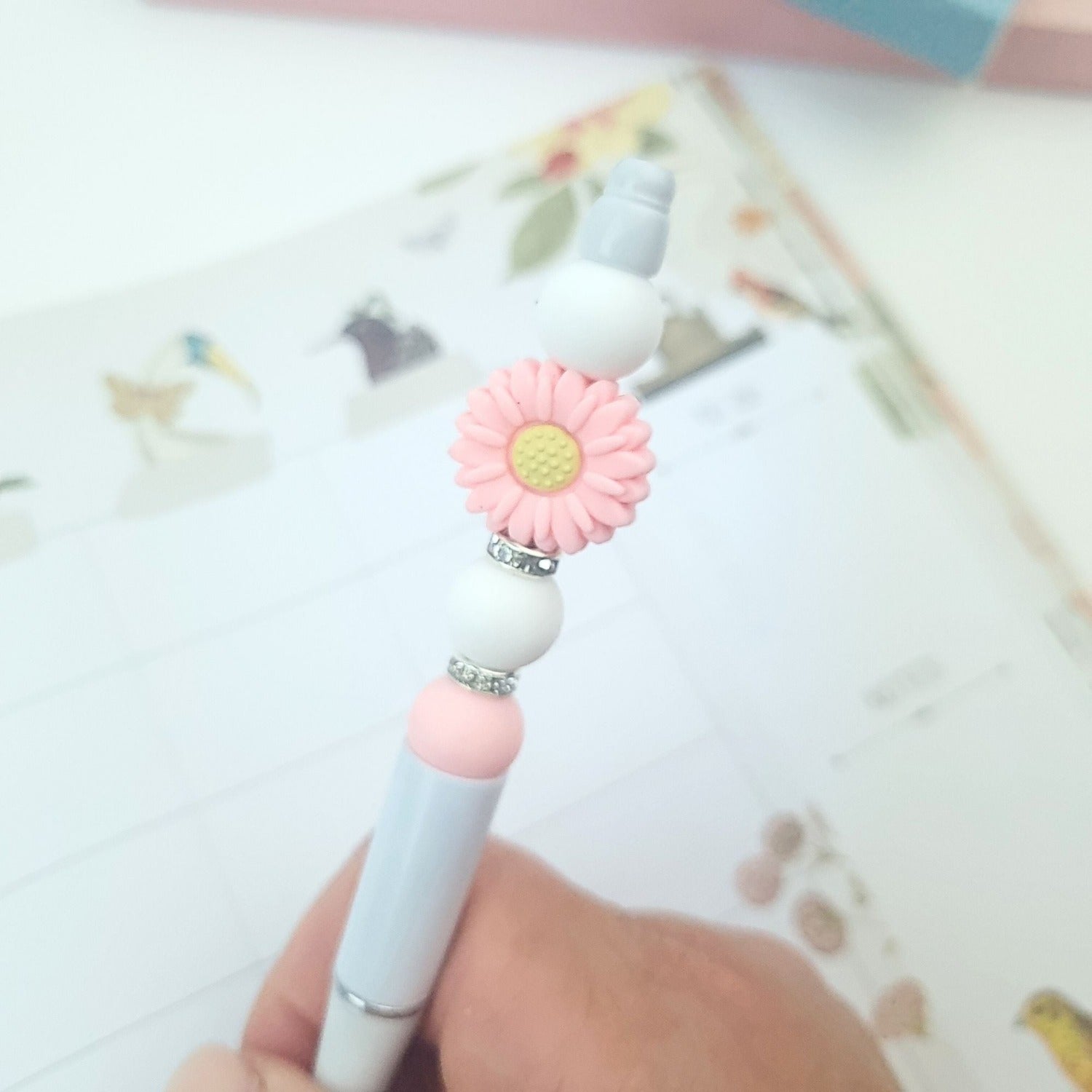 pink daisy in a white pen for teacher gifts