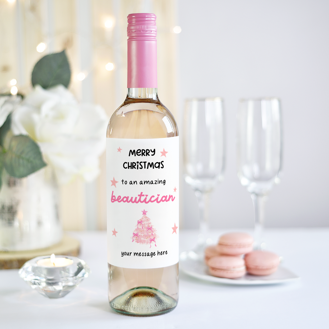 Personalised Christmas wine bottle label for beautician with pink festive design and custom message option.